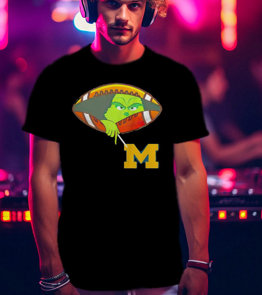 Grinch Peeking From Football Over Michigan Wolverines T-Shirt