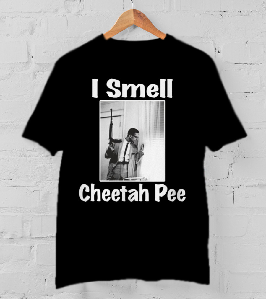 I Smell Cheetah Pee Man Holding Gun By Window T-Shirt