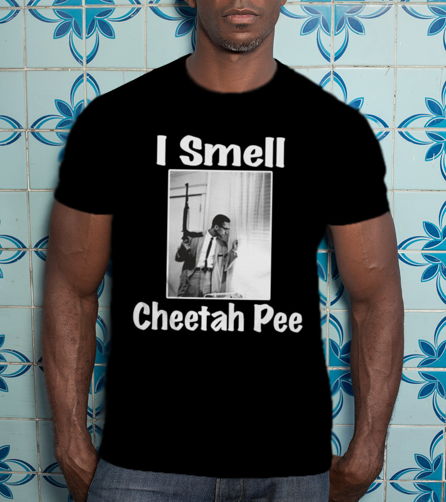 I Smell Cheetah Pee Man Holding Gun By Window T-Shirt