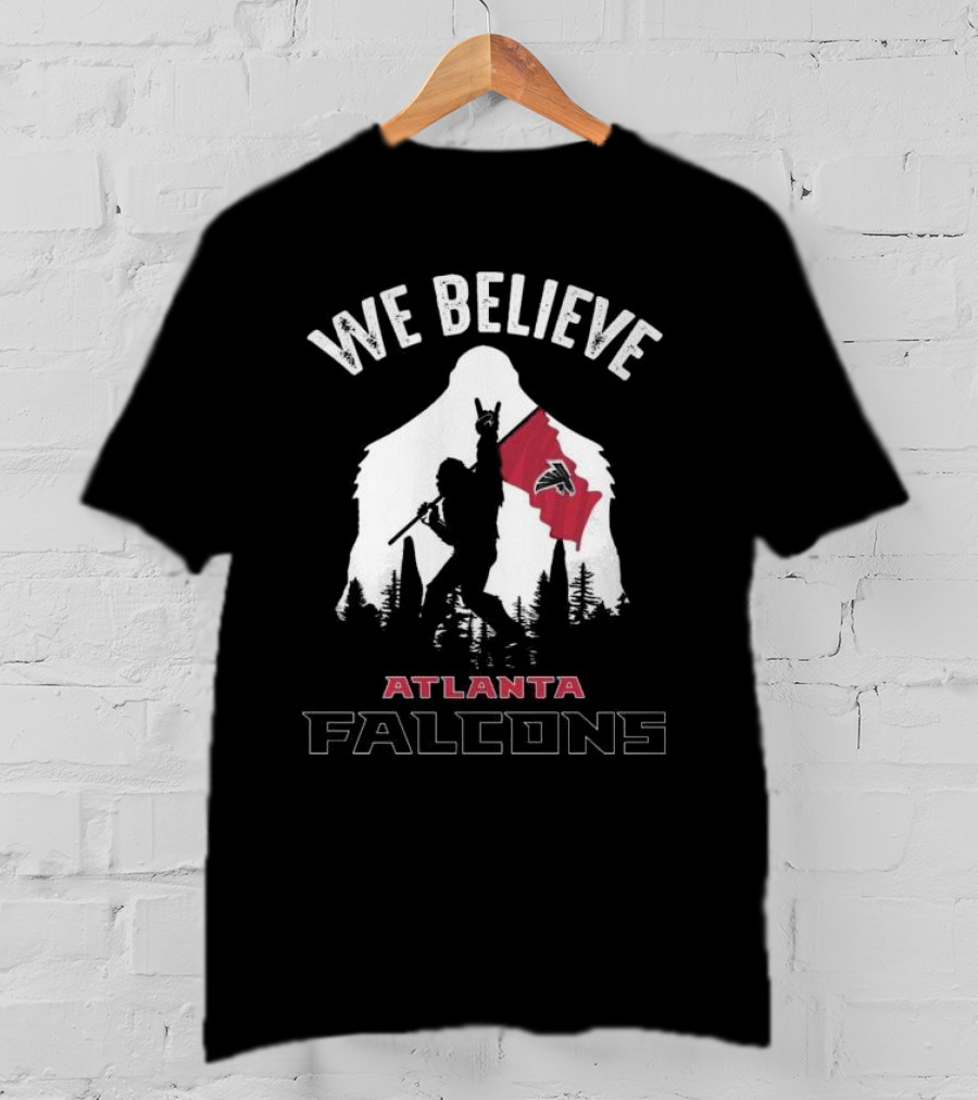 We Believe Bigfoot Holding Atlanta Falcons Flag T-Shirt