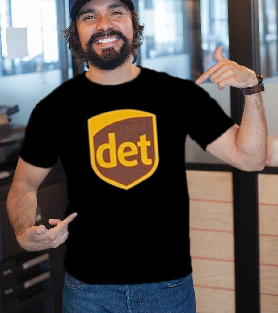 Amon-Ra Wearing Det Saint Brown Football T-Shirt
