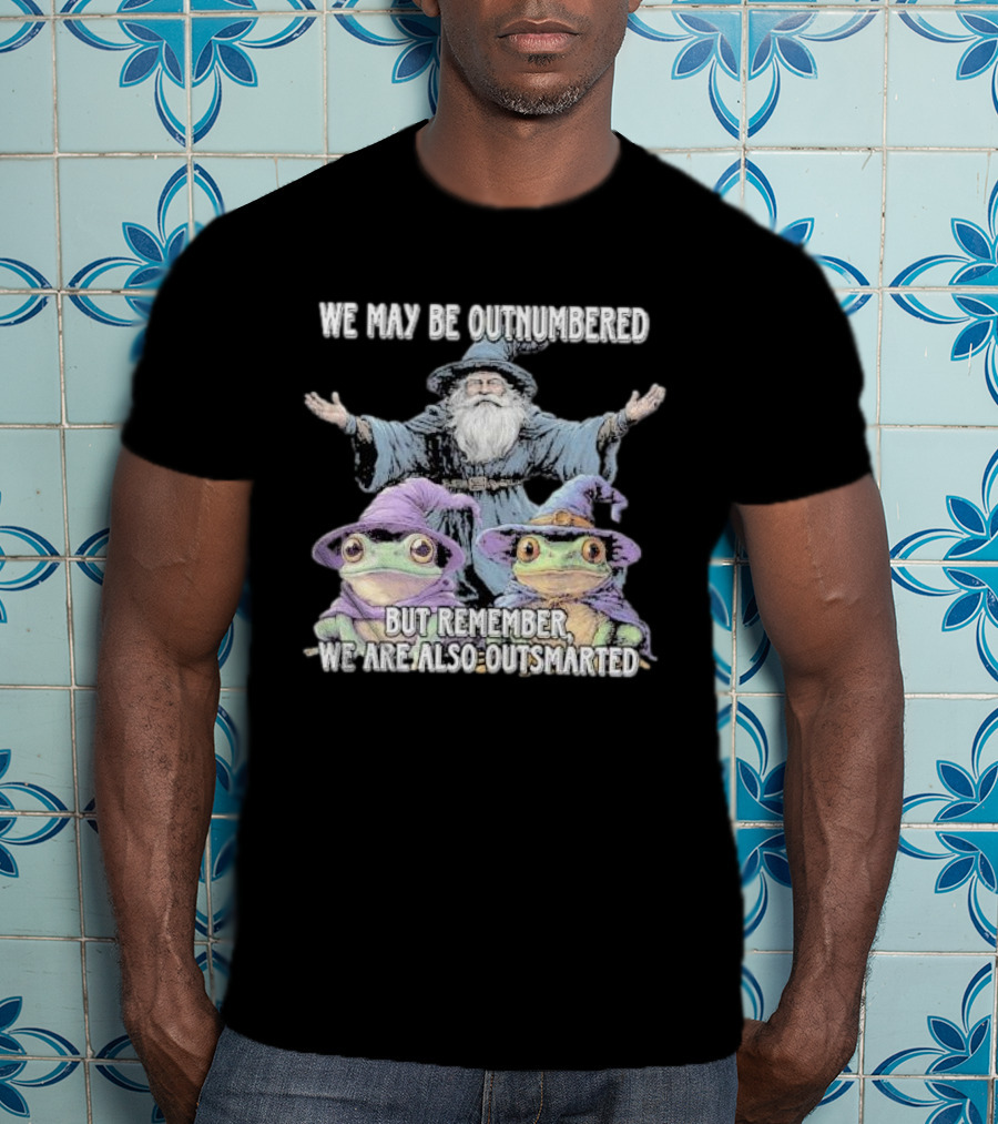 We May Be Outnumbered But Remember We Are Also Outsmarted Wizard And Frogs In Purple Hats T-Shirt