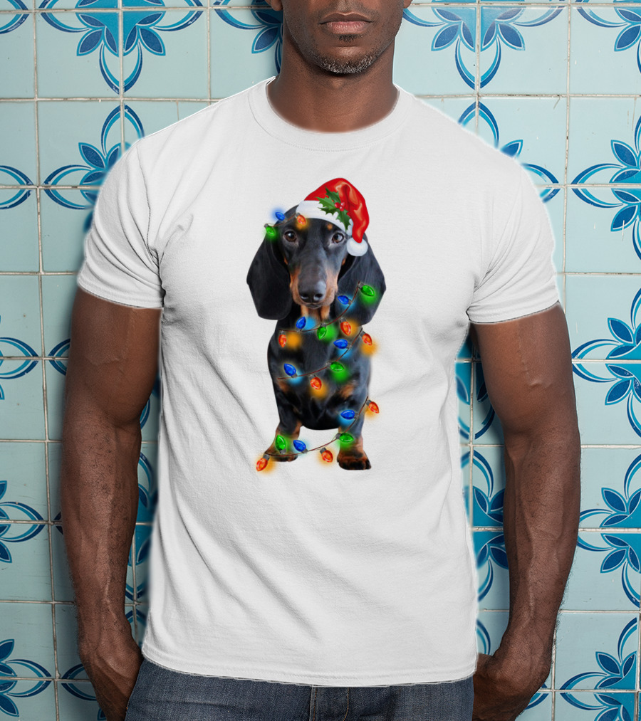 Black Dachshund Wearing Santa Hat And Wrapped In Christmas Lights T-Shirt