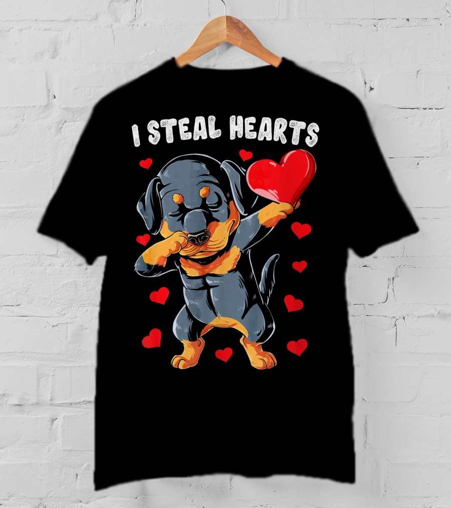 Dabbing Rottweiler Holding Heart Surrounded By I Steal Hearts Text T-Shirt