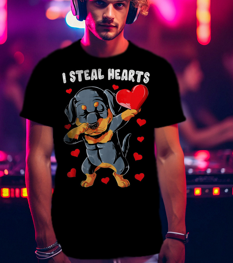 Dabbing Rottweiler Holding Heart Surrounded By I Steal Hearts Text T-Shirt