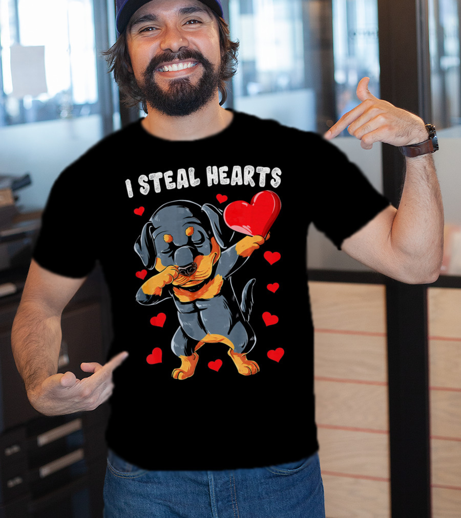 Dabbing Rottweiler Holding Heart Surrounded By I Steal Hearts Text T-Shirt