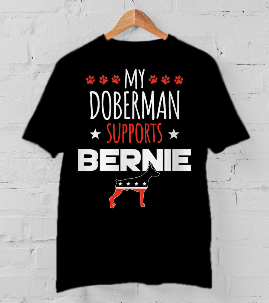 My Doberman Supports Bernie With Red White Blue Stars And Dog Paw Prints T-Shirt