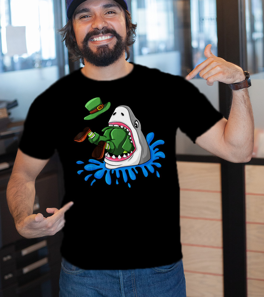 Shark Devours Leprechaun Wearing Green Outfit With Dropped Hat In Water Splash T-Shirt