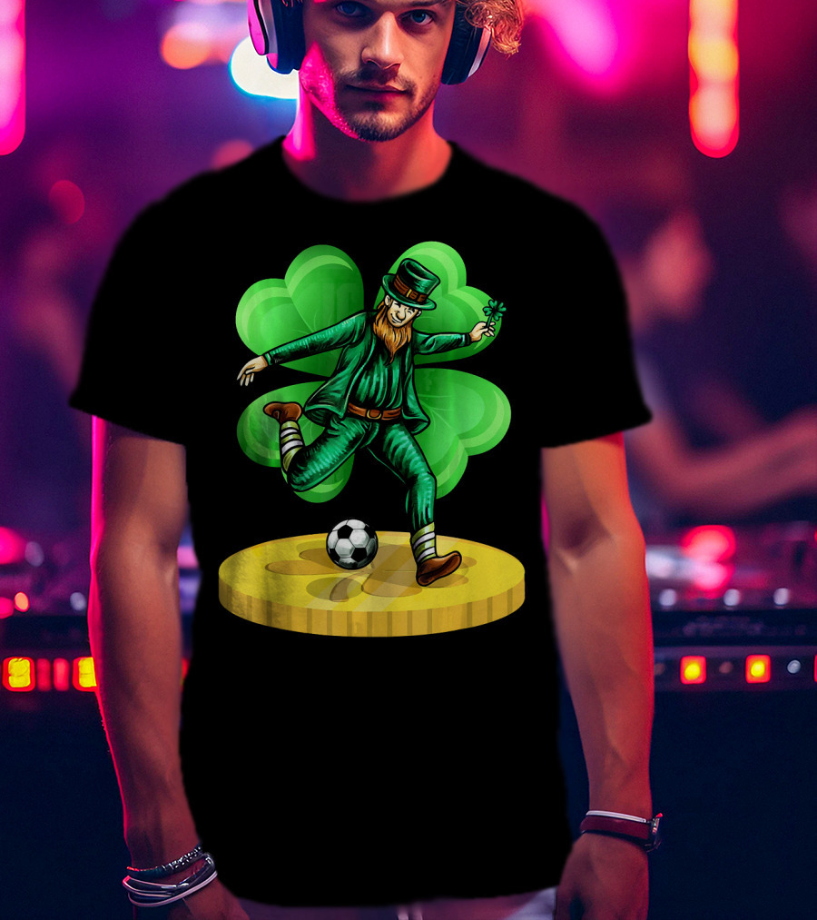 Leprechaun Kicking Soccer Ball On Gold Coin With Shamrock Background T-Shirt