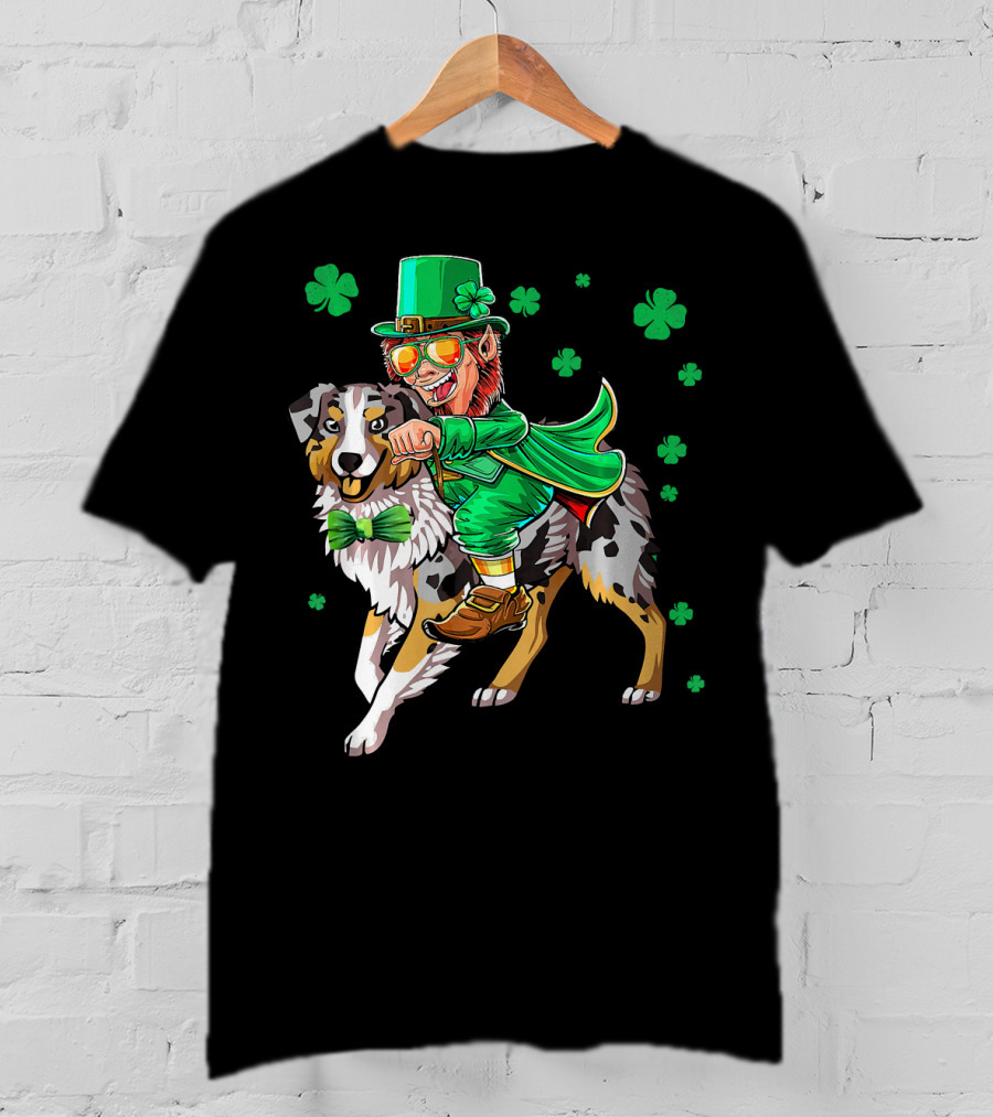 Leprechaun Riding Australian Shepherd With Shamrock Bow Tie And Clover Background T-Shirt