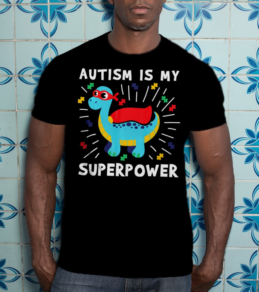 Autism Is My Superpower Dinosaur With Puzzle Pieces And Hero Cape T-Shirt
