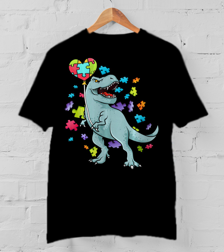 Autism Awareness Dinosaur With Puzzle Heart Balloon And Colorful Puzzle Pieces T-Shirt