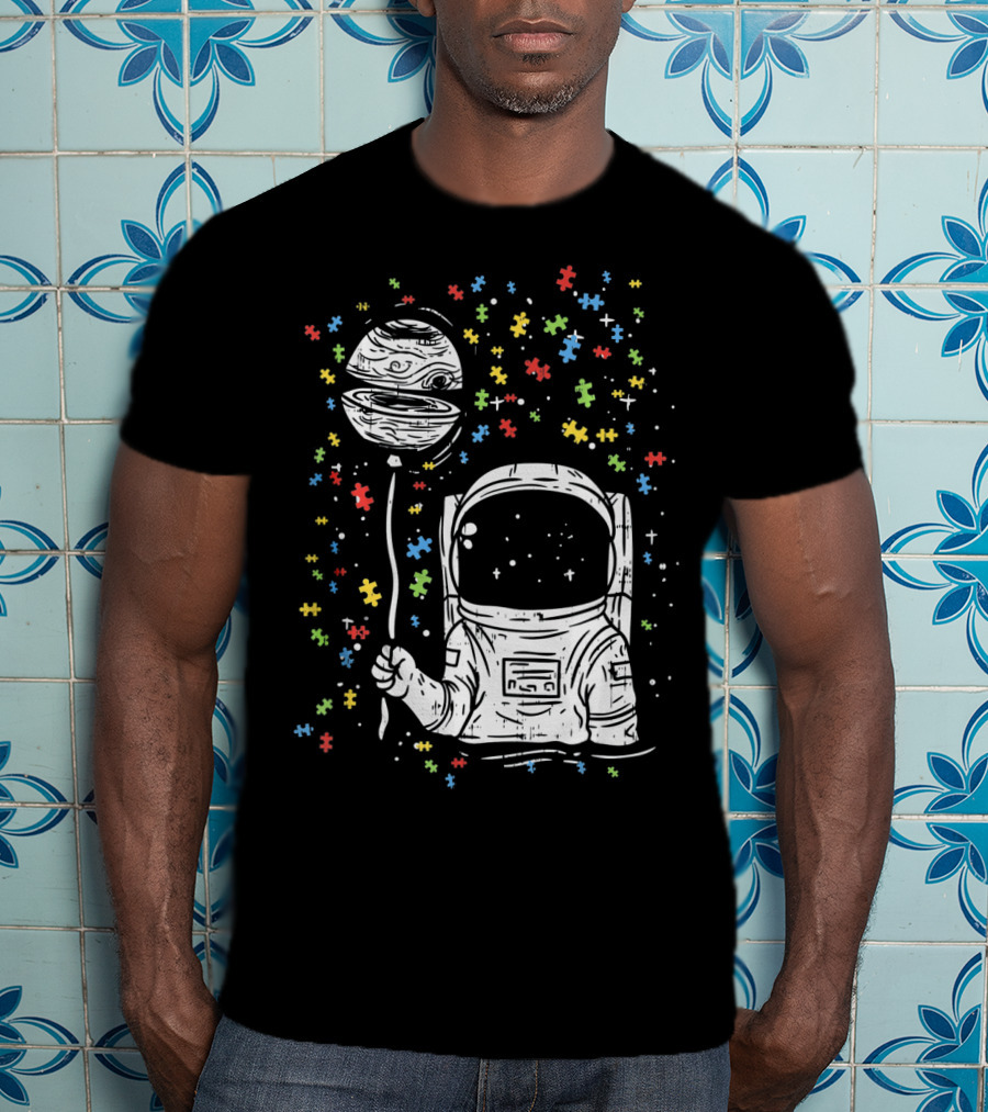 Astronaut Holding Planet Balloon With Puzzle Pieces For Autism Awareness T-Shirt