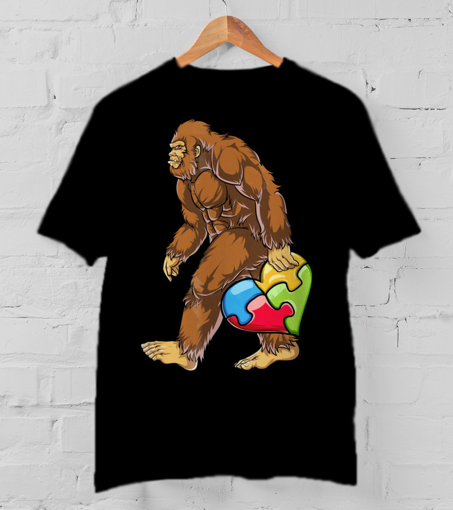 Bigfoot Holding Puzzle Piece Heart Autism Awareness T-Shirt