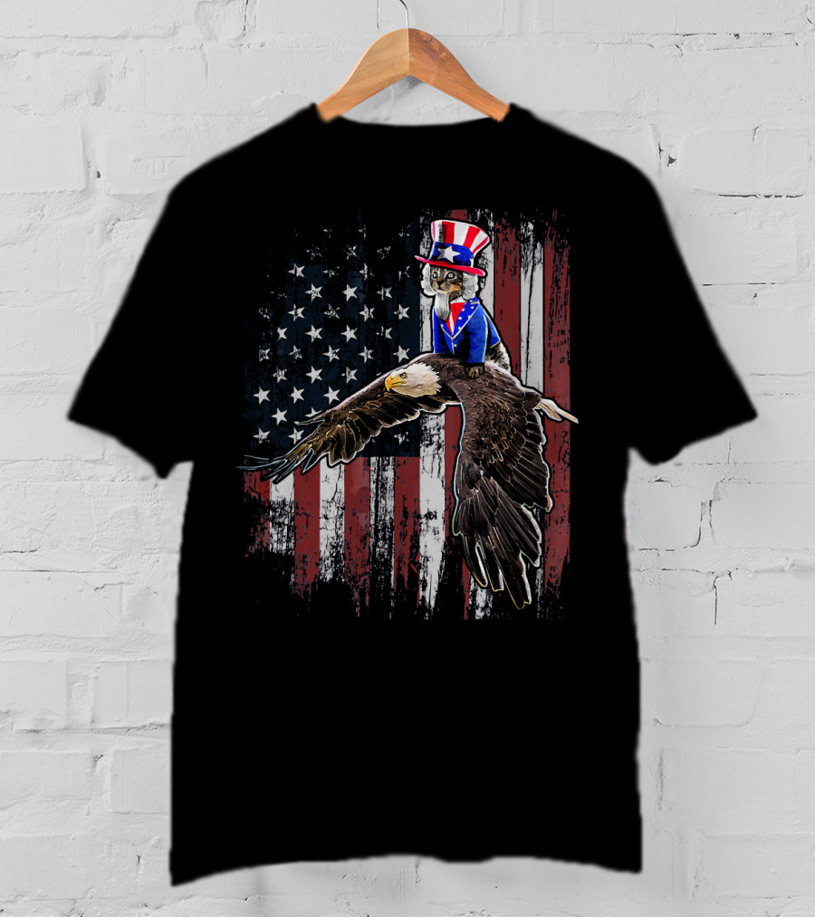 Uncle Sam Costume Cat Riding Bald Eagle On American Flag Background T-Shirt