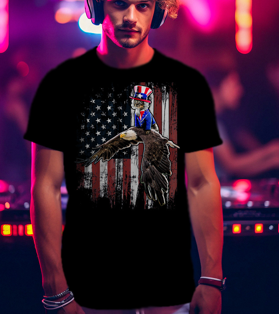 Uncle Sam Costume Cat Riding Bald Eagle On American Flag Background T-Shirt