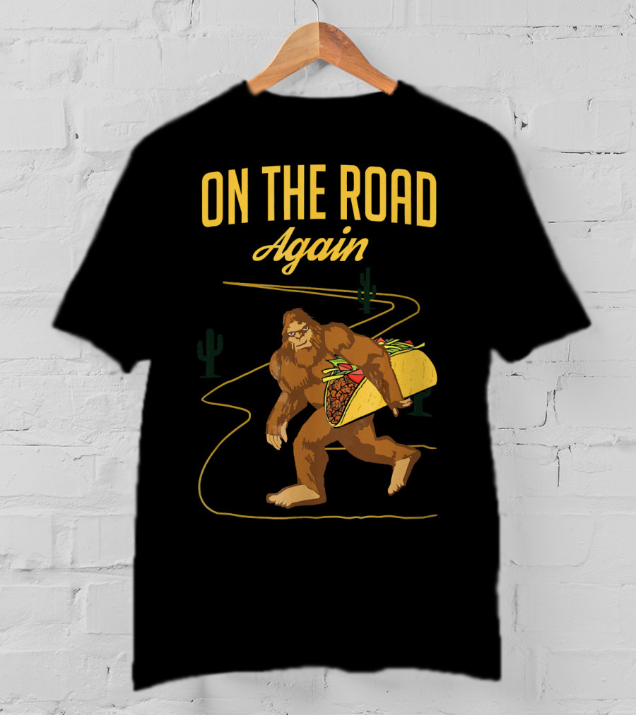 ON THE ROAD AGAIN Smirk Bigfoot Sasquatch Carrying Taco T-Shirt