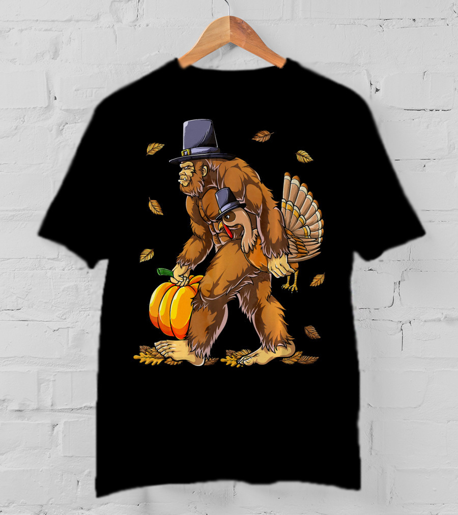 Bigfoot Pilgrim Turkey Carrying Pumpkin Thanksgiving T-Shirt