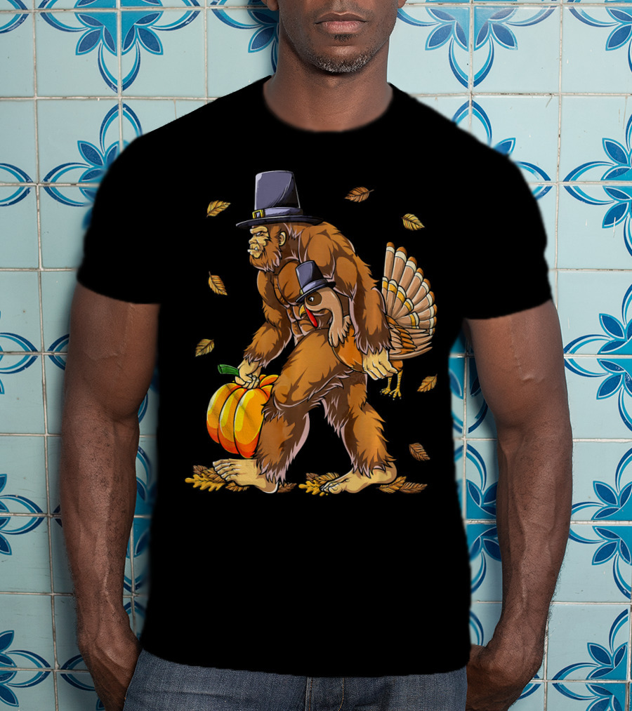 Bigfoot Pilgrim Turkey Carrying Pumpkin Thanksgiving T-Shirt