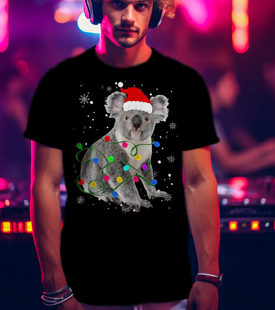 Koala Wrapped In Christmas Lights Wearing Santa Hat With Snowflakes Matching Fam T-Shirt