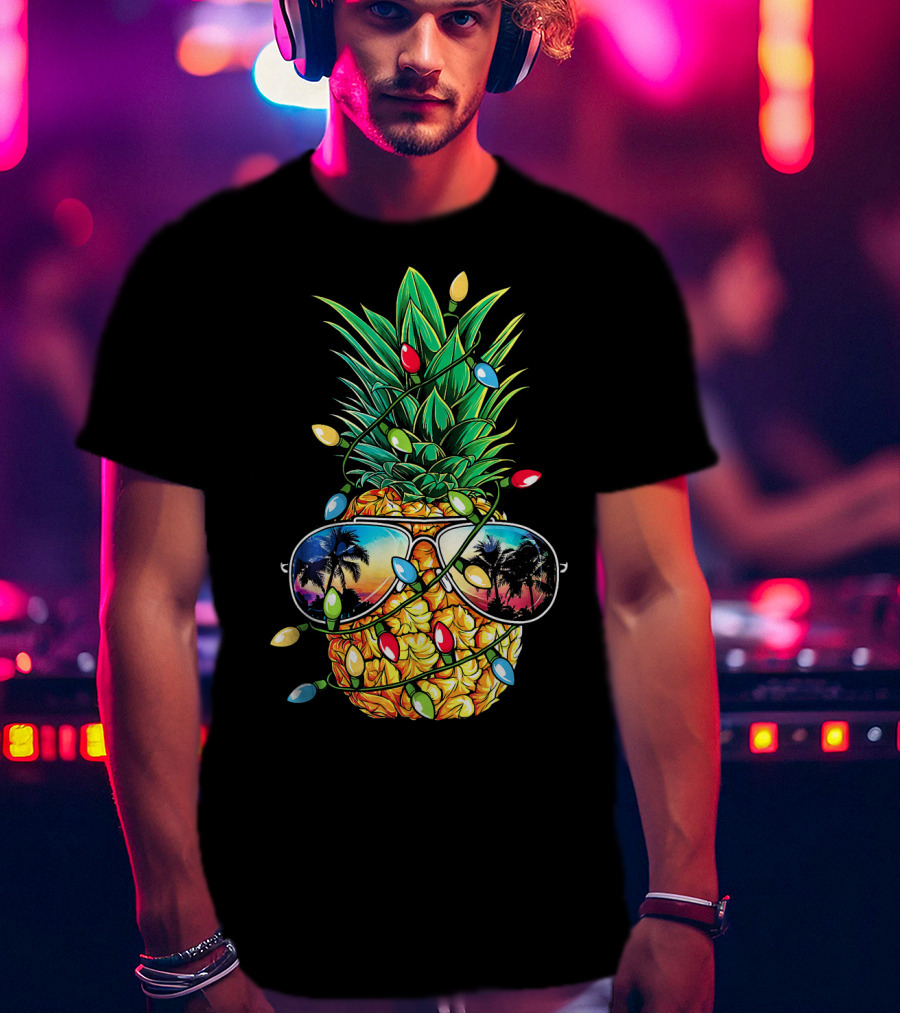 Pineapple Wrapped In Christmas Lights With Sunglasses Reflected Sunset And Palm Trees T-Shirt
