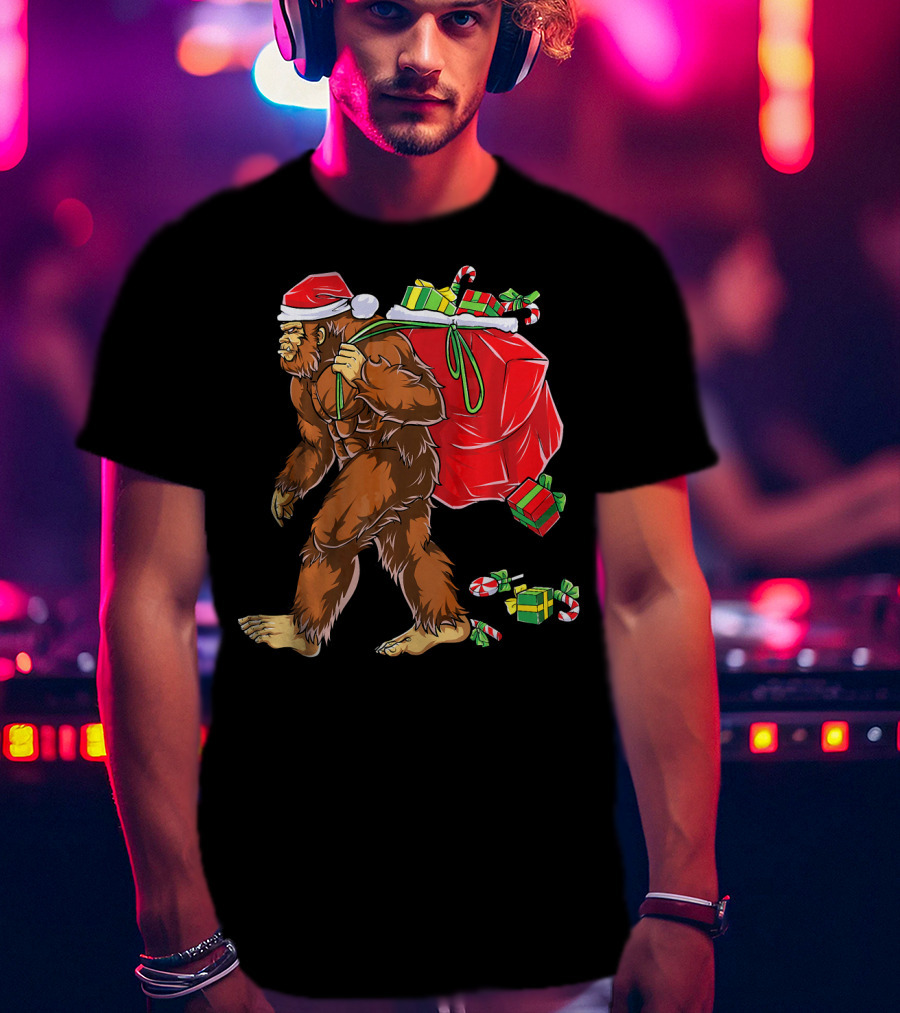 Bigfoot Santa Carrying Gifts With Candy Canes T-Shirt