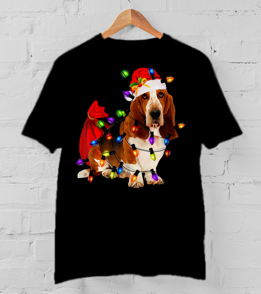 Basset Hound Wrapped In Christmas Lights With Santa Hat And Red Sack T-Shirt