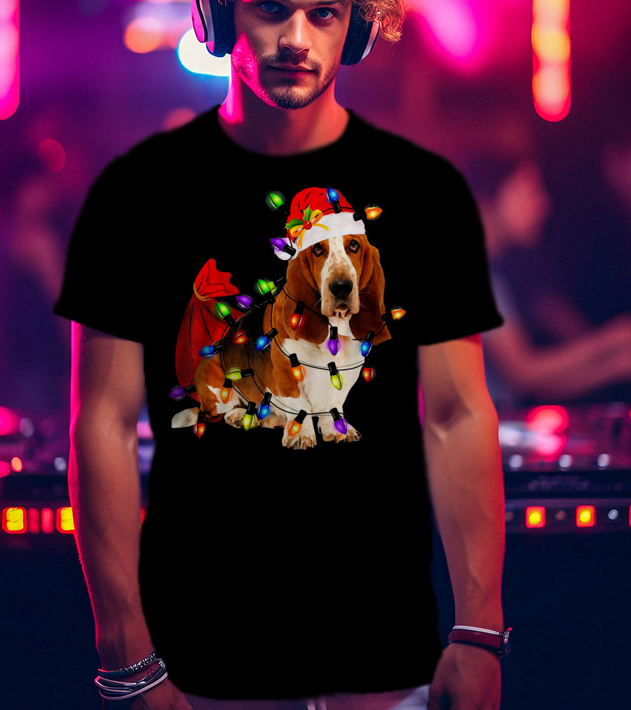 Basset Hound Wrapped In Christmas Lights With Santa Hat And Red Sack T-Shirt