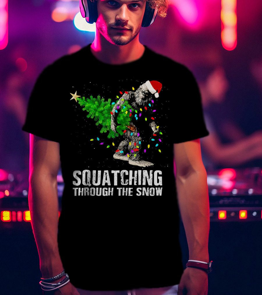 Squatching Through The Snow Bigfoot Christmas Lights Santa Hat T-Shirt