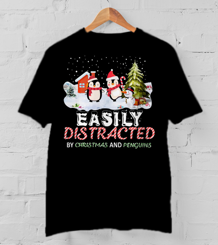 Easily Distracted By Christmas And Penguins In Winter Wonderland With Snowman House And Tree T-Shirt