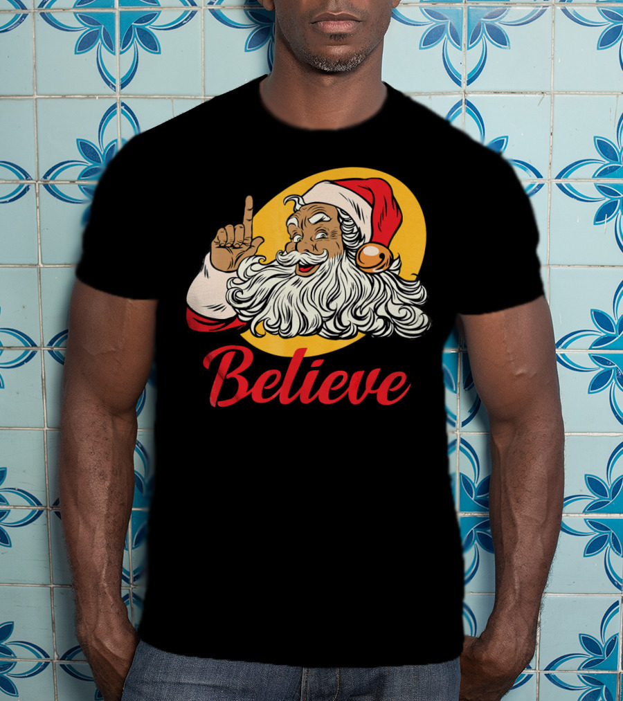 Black Santa Claus With Believe Caption And Yellow Background T-Shirt