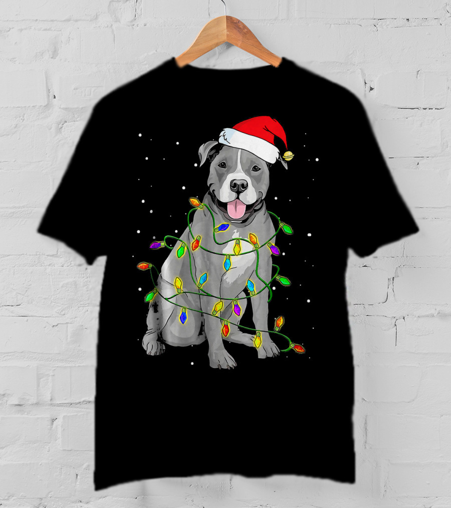 Pitbull In Santa Hat Wrapped In Christmas Lights With Snowy Background T-Shirt
