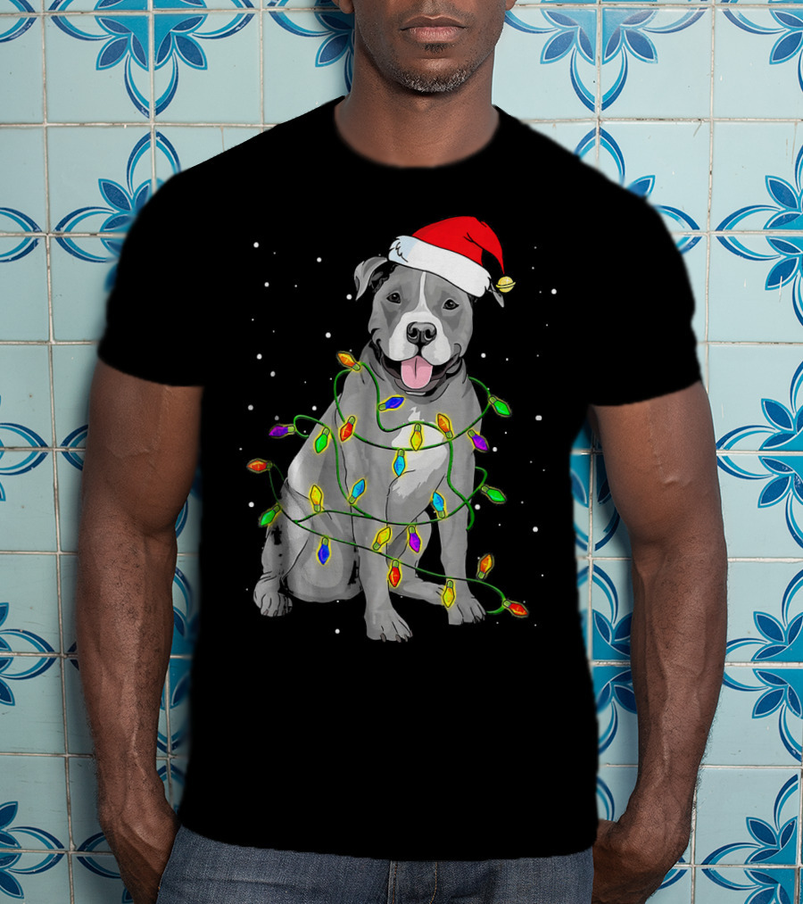 Pitbull In Santa Hat Wrapped In Christmas Lights With Snowy Background T-Shirt