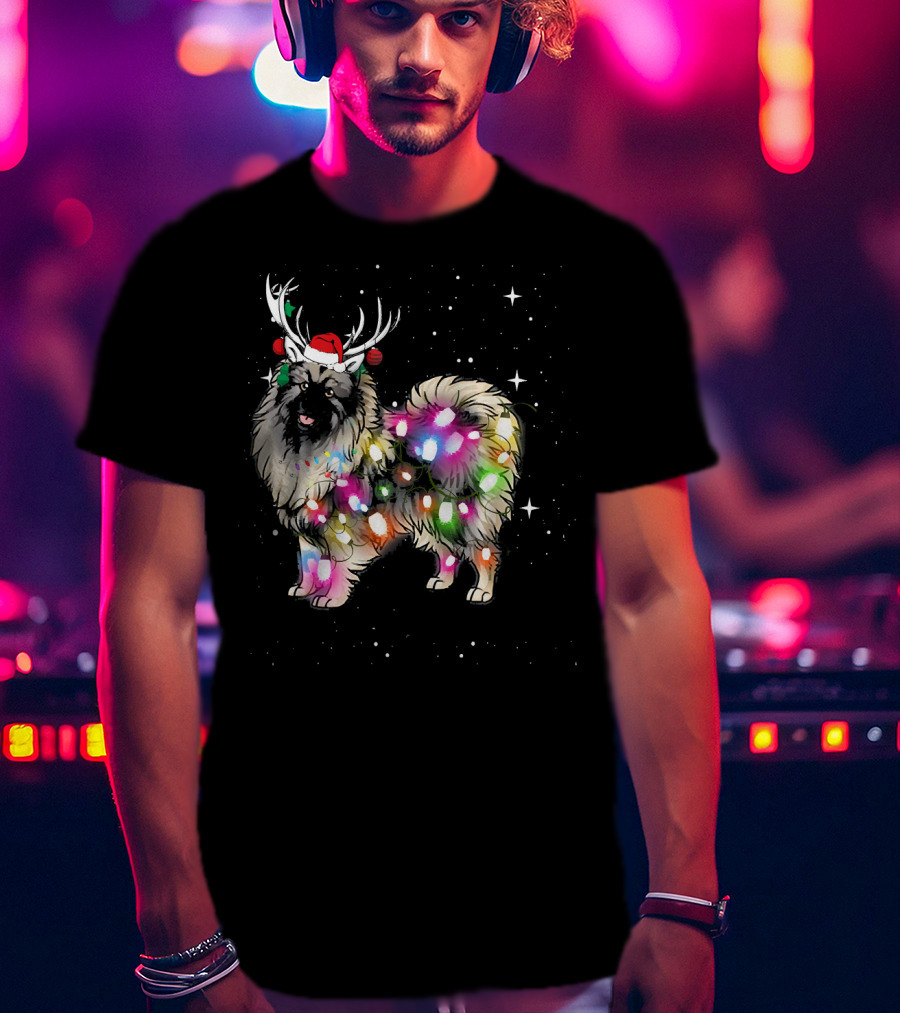 Keeshond Dog Wrapped In Christmas Lights Wearing Red Santa Hat And Antlers T-Shirt