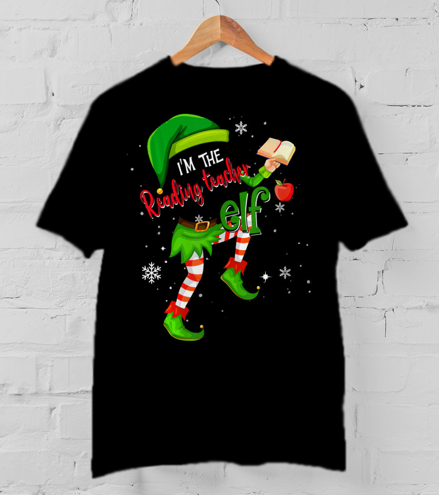I'm The Reading Teacher Elf Holding Book Apple Wearing Elf Outfit Snowflakes T-Shirt
