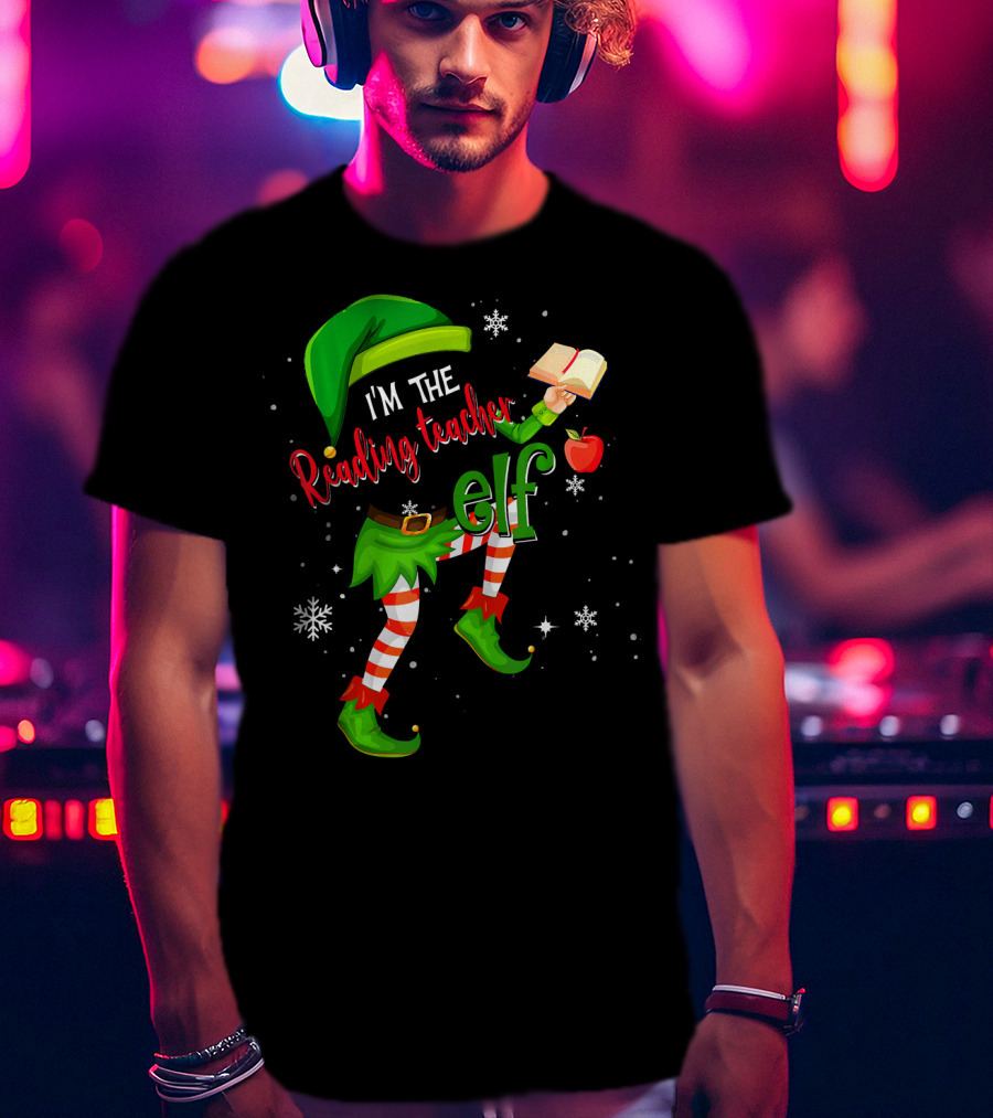 I'm The Reading Teacher Elf Holding Book Apple Wearing Elf Outfit Snowflakes T-Shirt