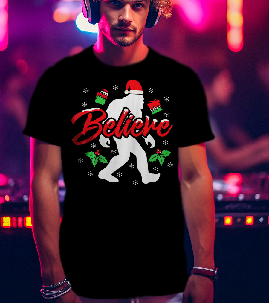 Believe Bigfoot Christmas Santa Hat Snowflakes Holly T-Shirt