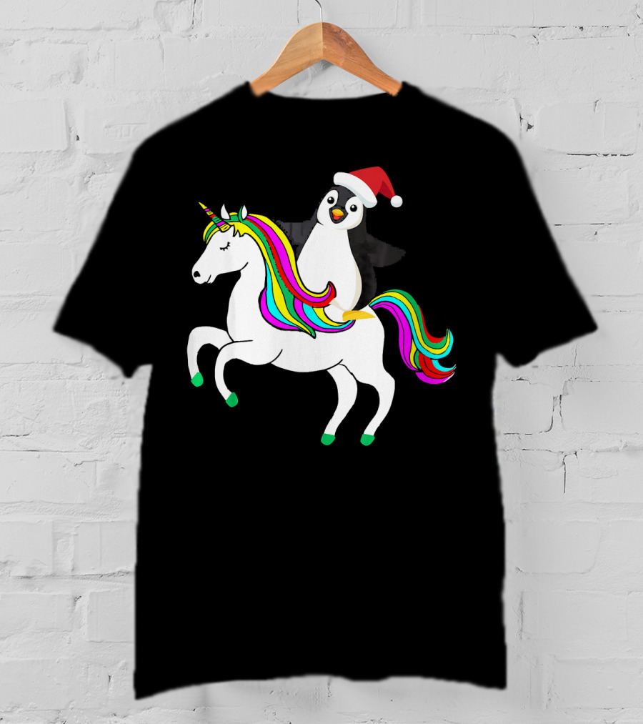 Penguin In Santa Hat Riding A Rainbow Unicorn T-Shirt