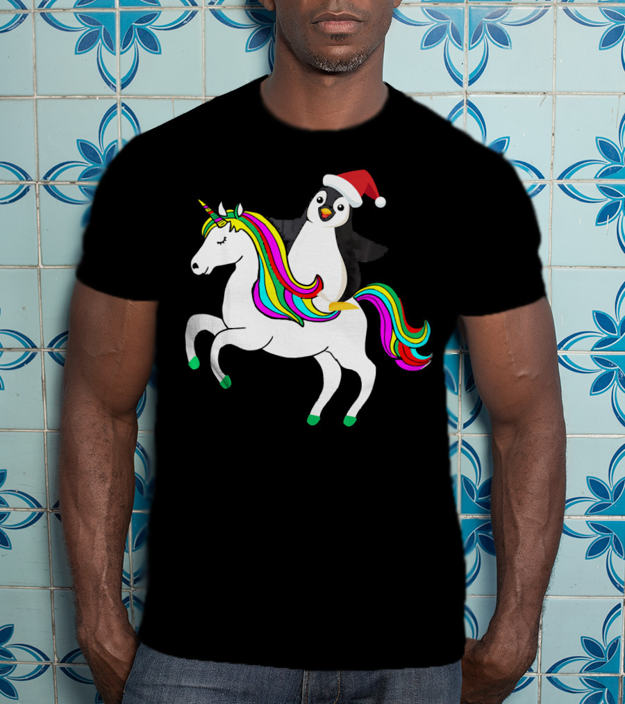 Penguin In Santa Hat Riding A Rainbow Unicorn T-Shirt