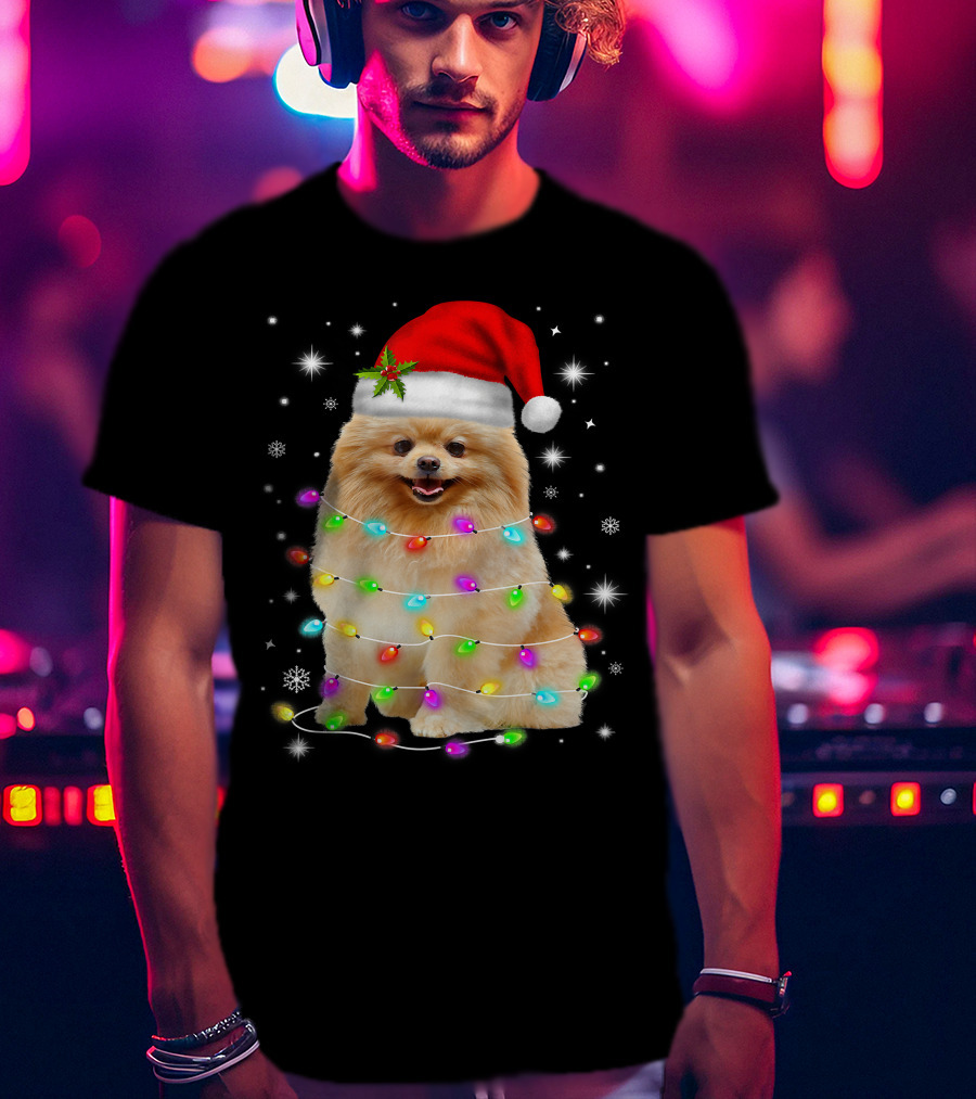 Pomeranian Pup Wrapped In Christmas Lights With Santa Hat And Festive Glow T-Shirt
