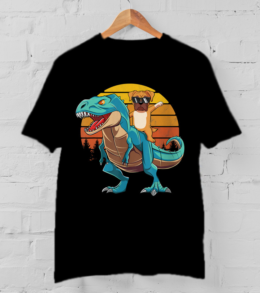 Boxer Dog With Sunglasses Riding Blue T-Rex Against Sunset Background T-Shirt